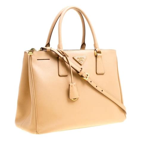 prada saffiano lux top handle beige|Prada saffiano bag.